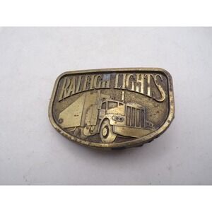 Vintage Raleigh Lights Brass Belt Buckle Semi Truck 18 Wheeler Tobacco Promo